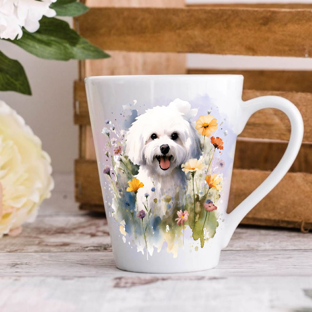 A white ceramic latte coffee mug featuring a printed image of a Bichon Frise dog surrounded by colourful flowers on the front and back.