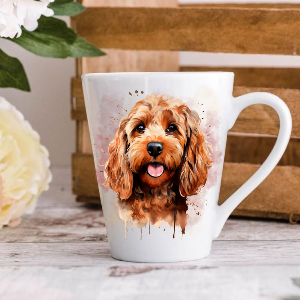A ceramic mug with a printed image of an apricot cockapoo dog.
