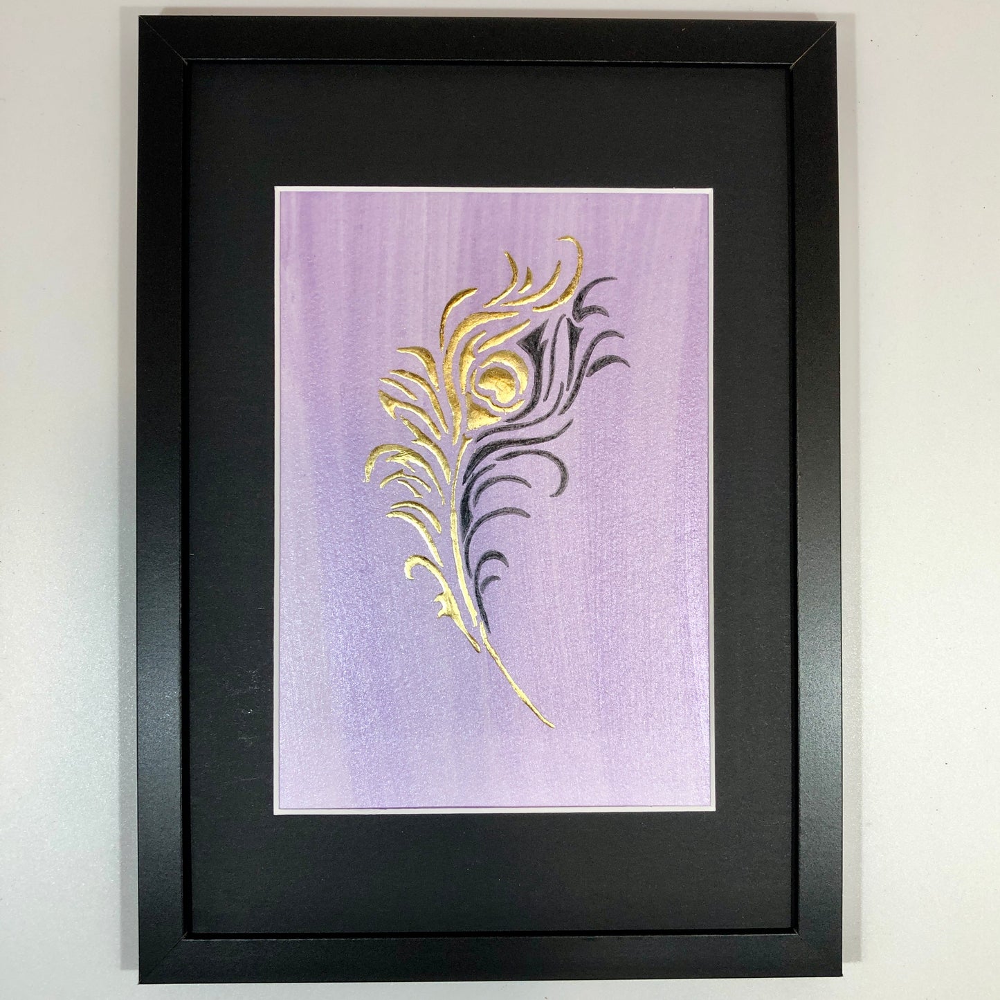 gold leaf feather