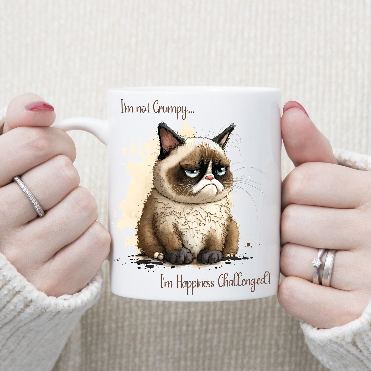 White ceramic mug with an image of Grumpy Cat and a quote. Grumpy face with brown markings and blue eyes.