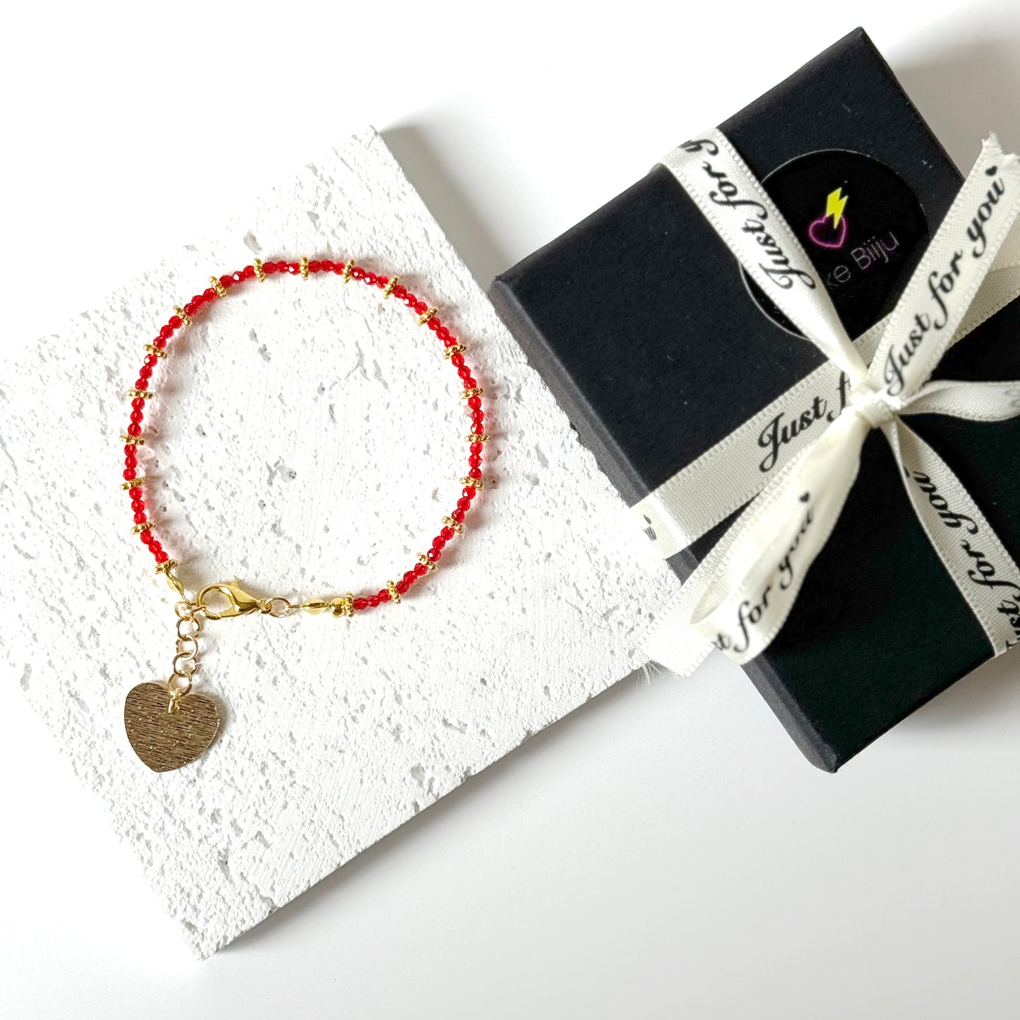 red glass bead bracelet