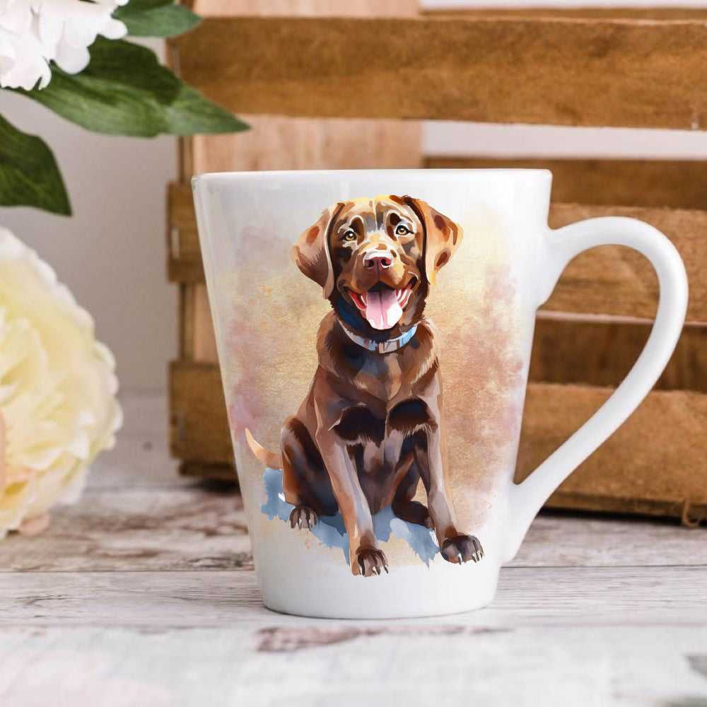 A 12oz white ceramic latte mug with a printed image of a chocolate Labrador dog, positioned on a wooden surface with a blurred background.