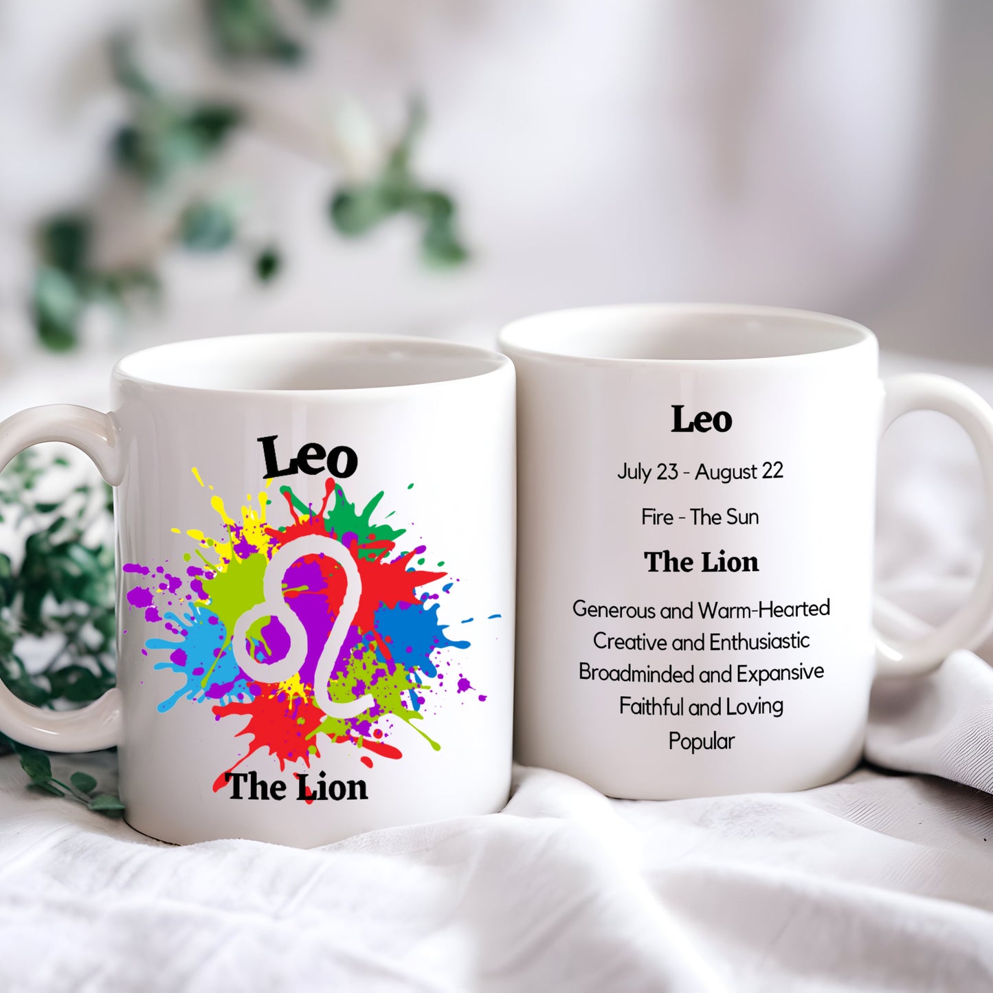 A white ceramic coffee mug with a colorful abstract design and the text 'Leo - The Lion', along with a description of the Leo zodiac sign.