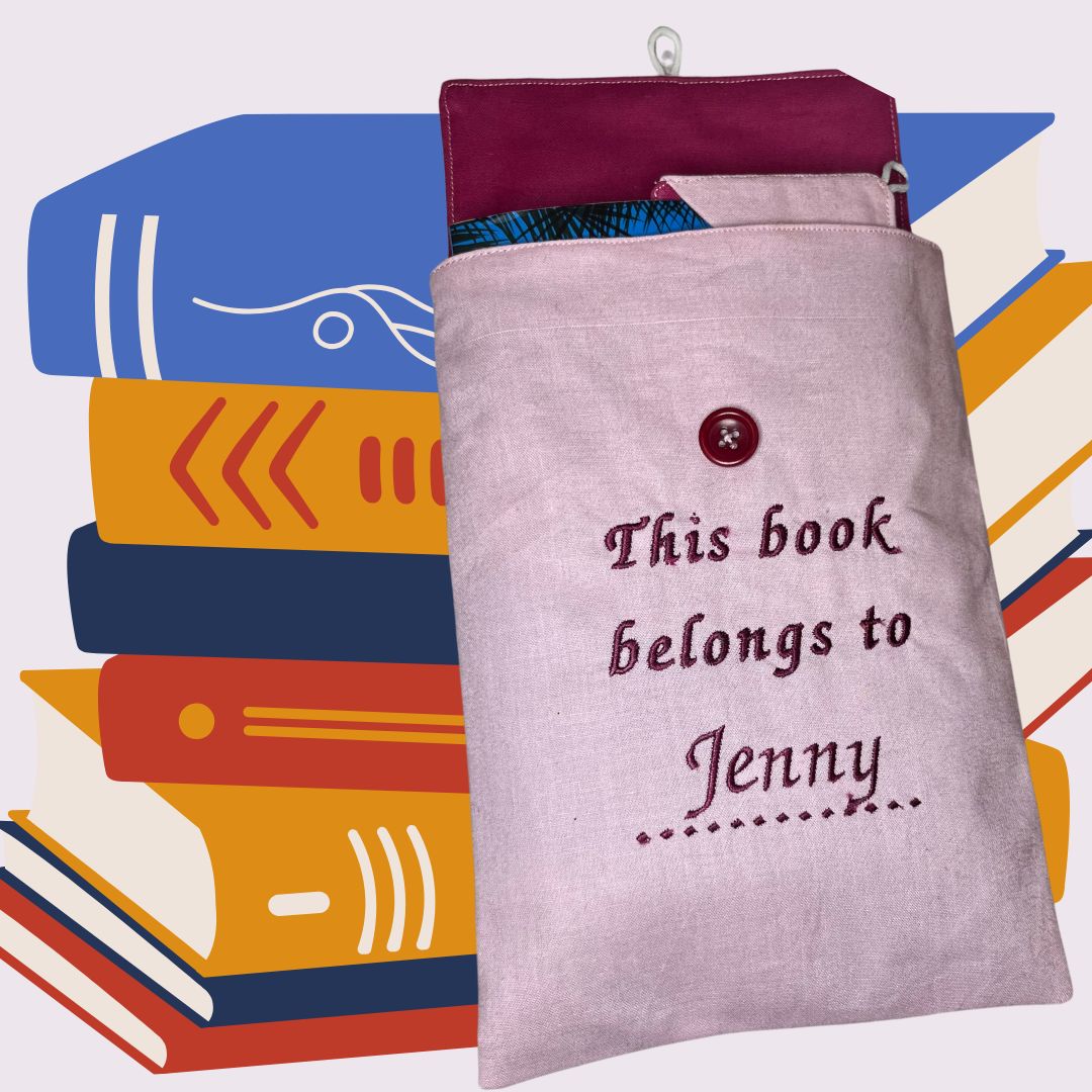 An example of a personalised book cosy shown with a stack of books