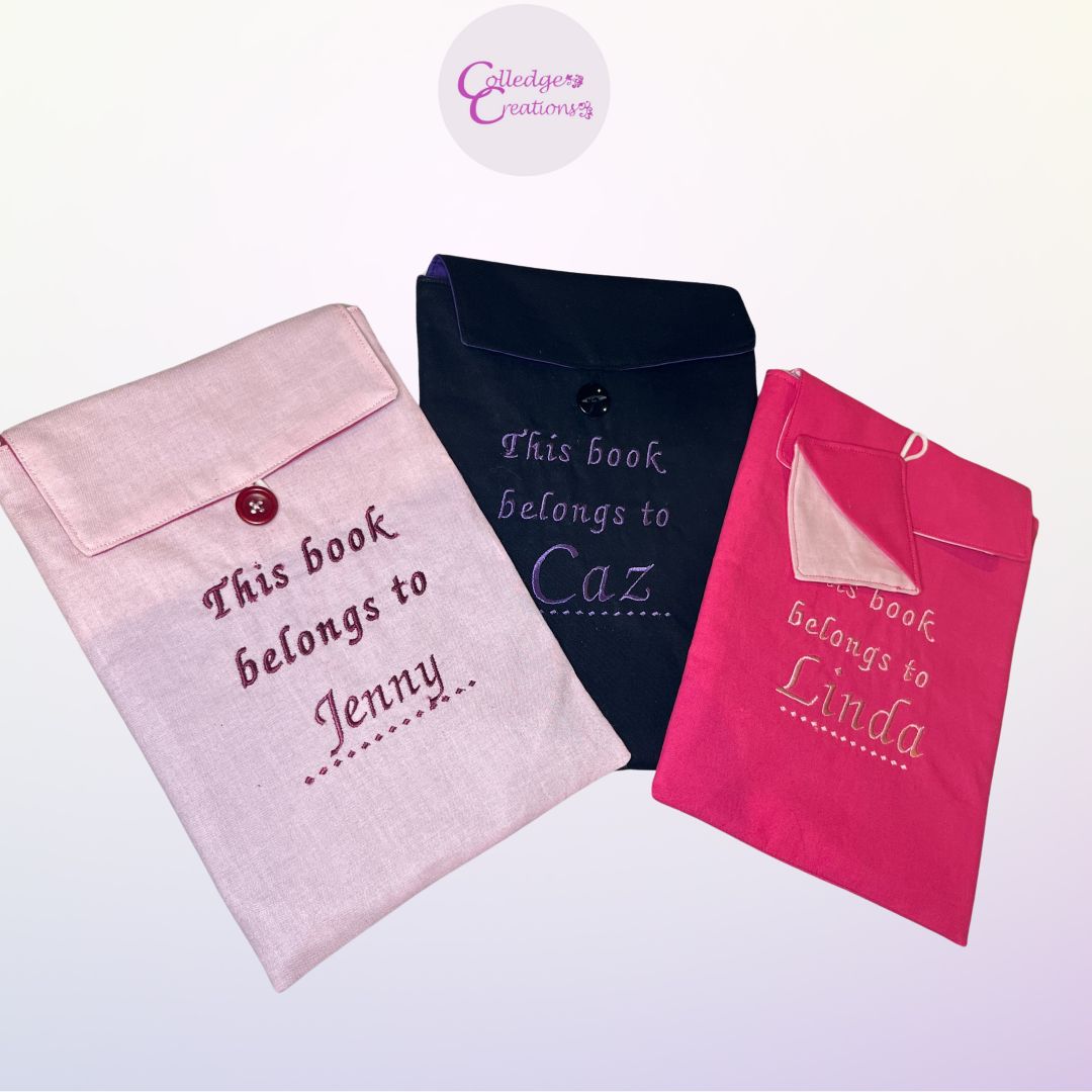 3 book cosys in blush pink, bright pink and navy shown personalised as custom options
