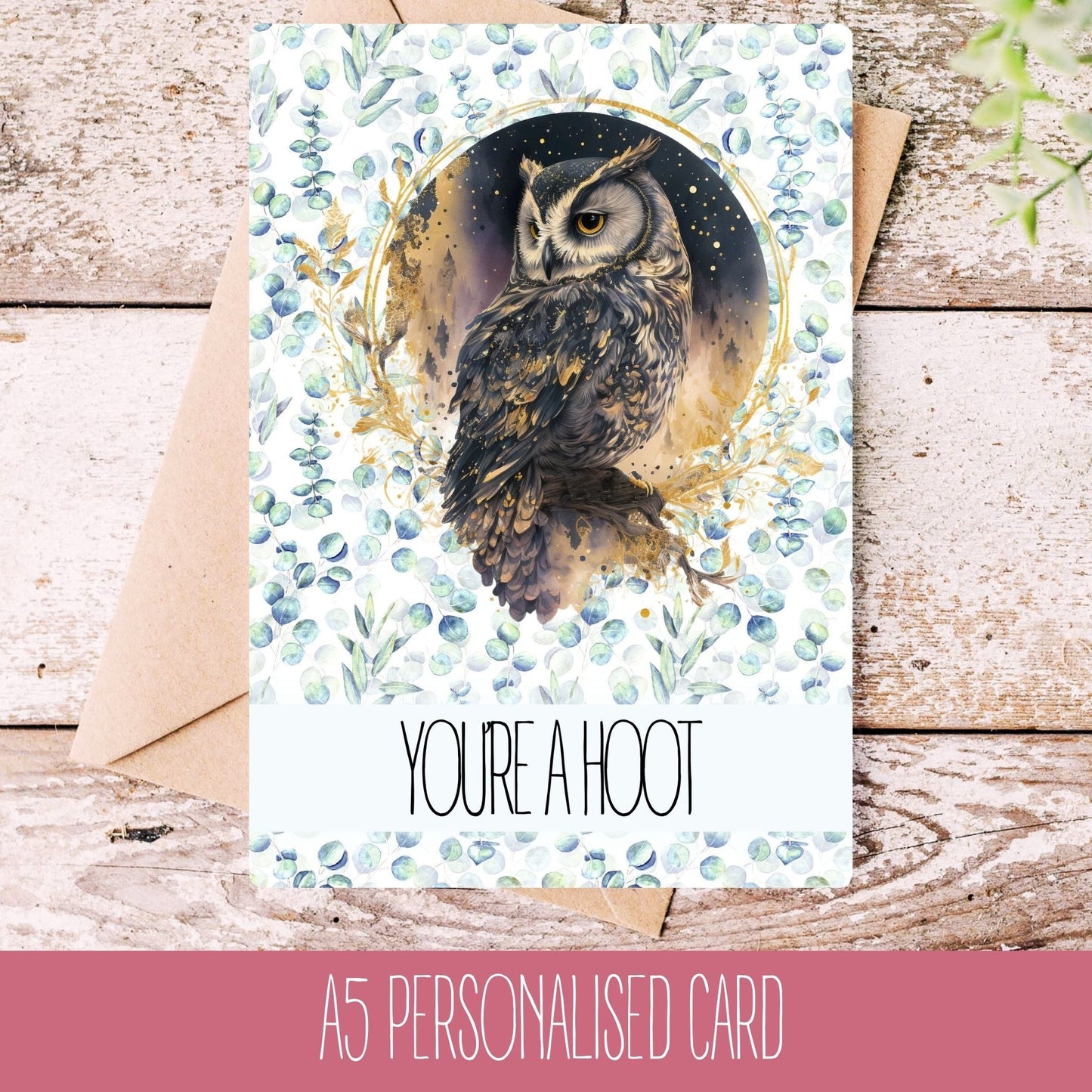 A birthday card with a watercolor illustration of an owl, surrounded by foliage, with a full moon in the background. The text on the card reads 'YOU'RE A HOOT'.