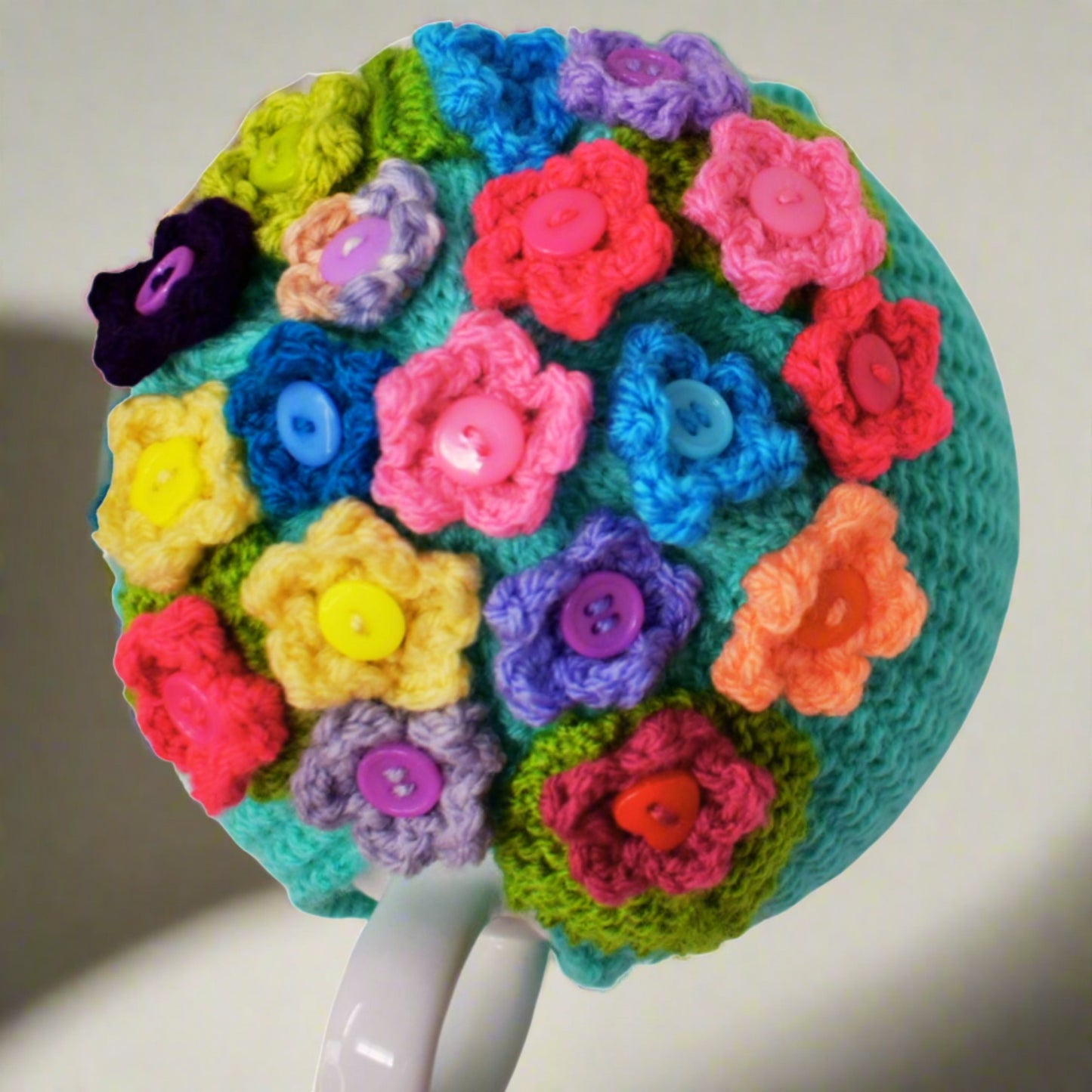 large knitted tea cosy