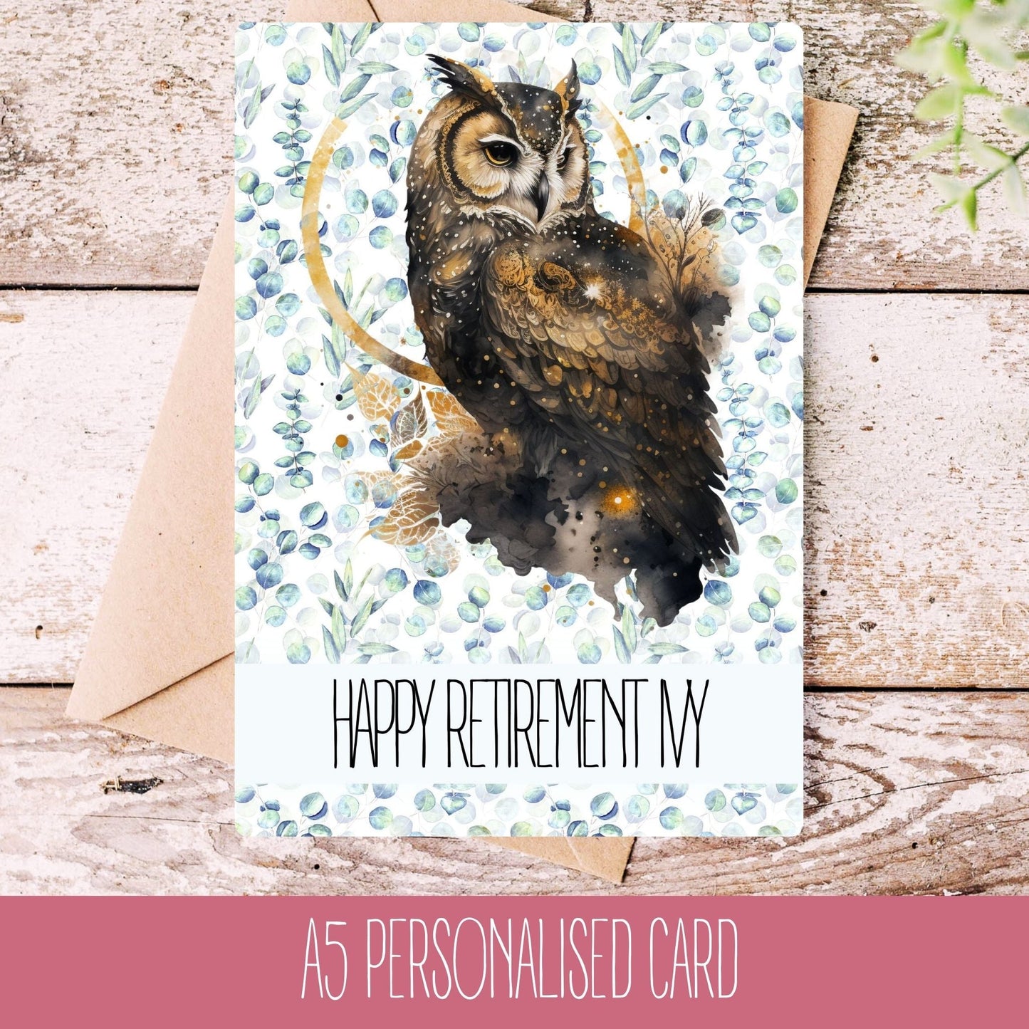 A handmade birthday card with an owl illustration, featuring text 'Happy Retirement ivy'. The card is placed on a wooden surface with a white envelope beside it.