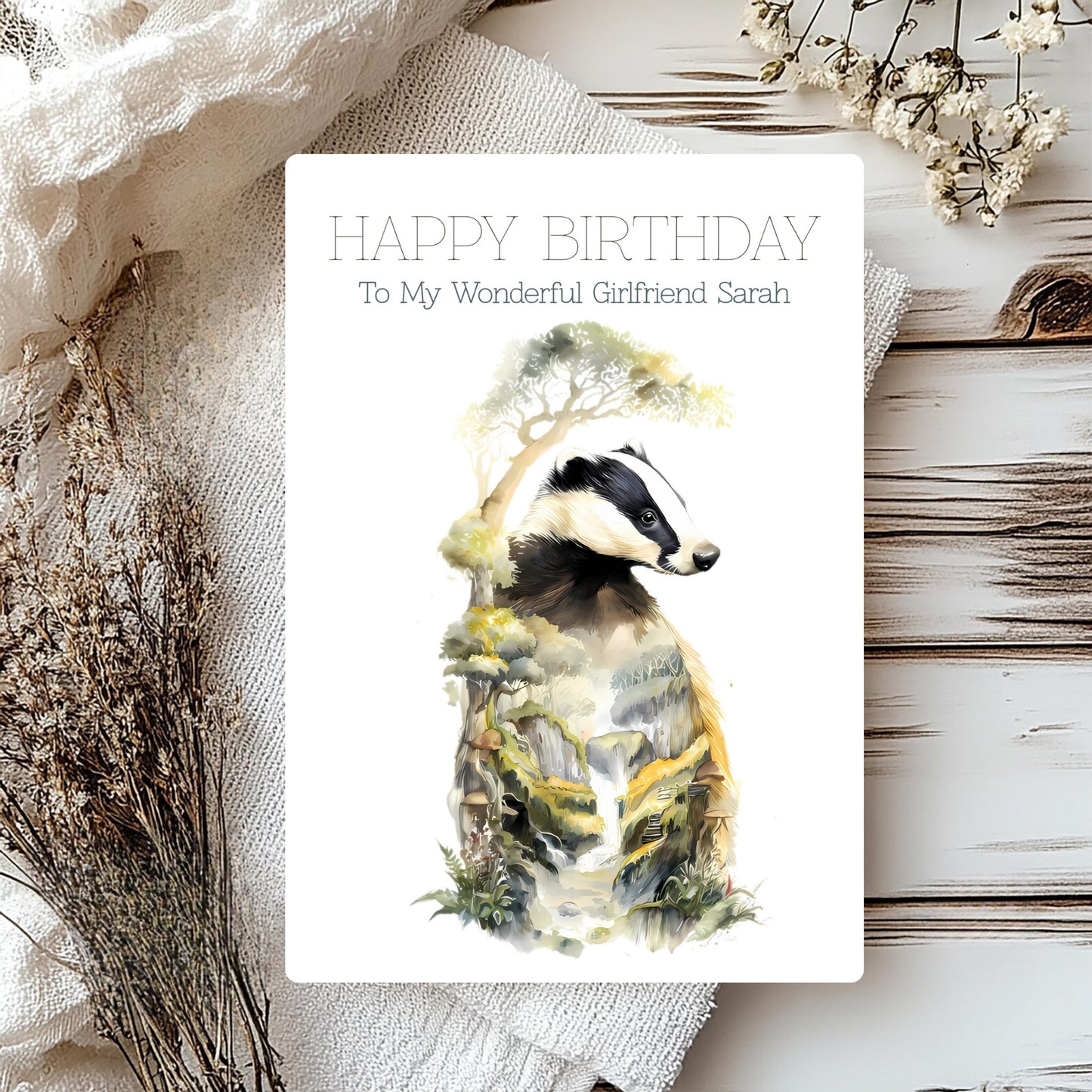 Greeting card with a badger illustration and 'Happy Birthday' text on a rustic background.