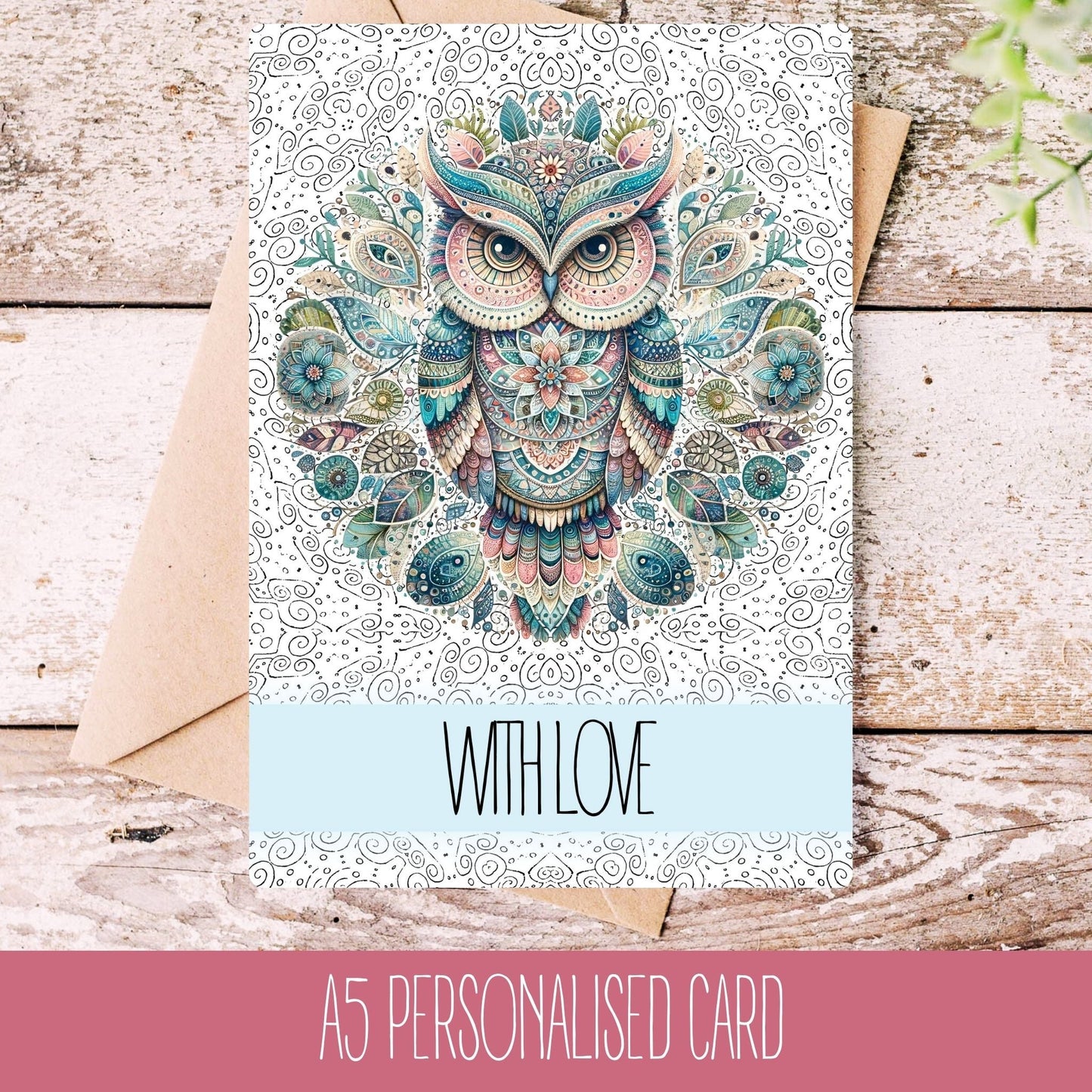 A personalised mandala greetings card with a colourful owl design on the front, placed on a wooden background with the text 'WITH LOVE' visible.