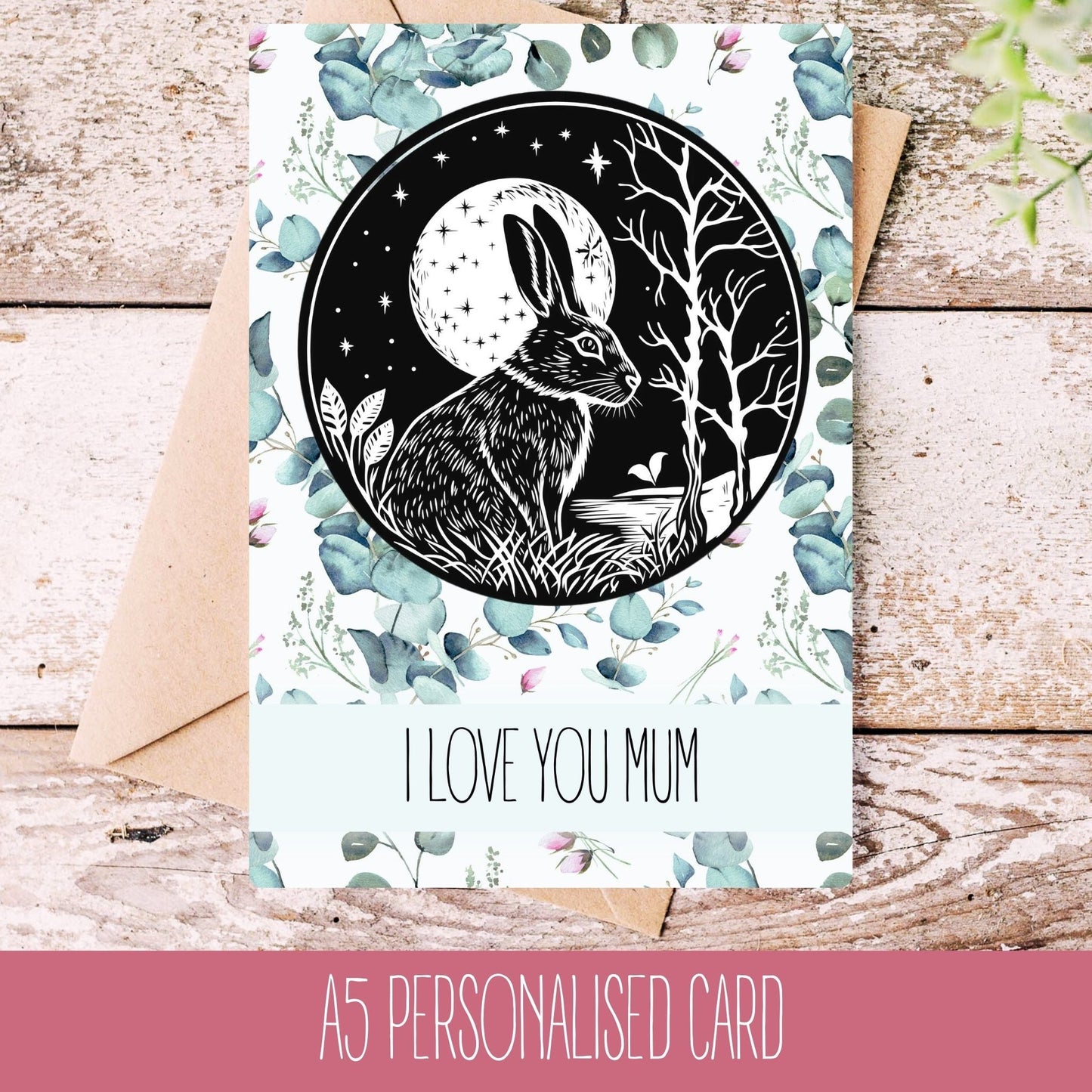 A personalised birthday card featuring an illustration of a hare in a party hat, with a moon and stars background, and the text 'I love you mum'.