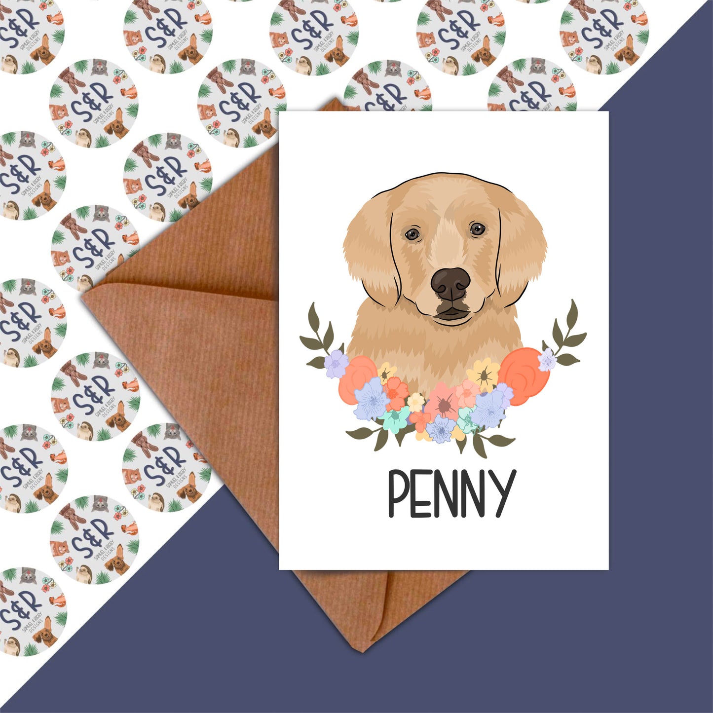 A greeting card featuring an illustration of a Golden Retriever dog with a floral wreath and the name 'Penny' on the front.