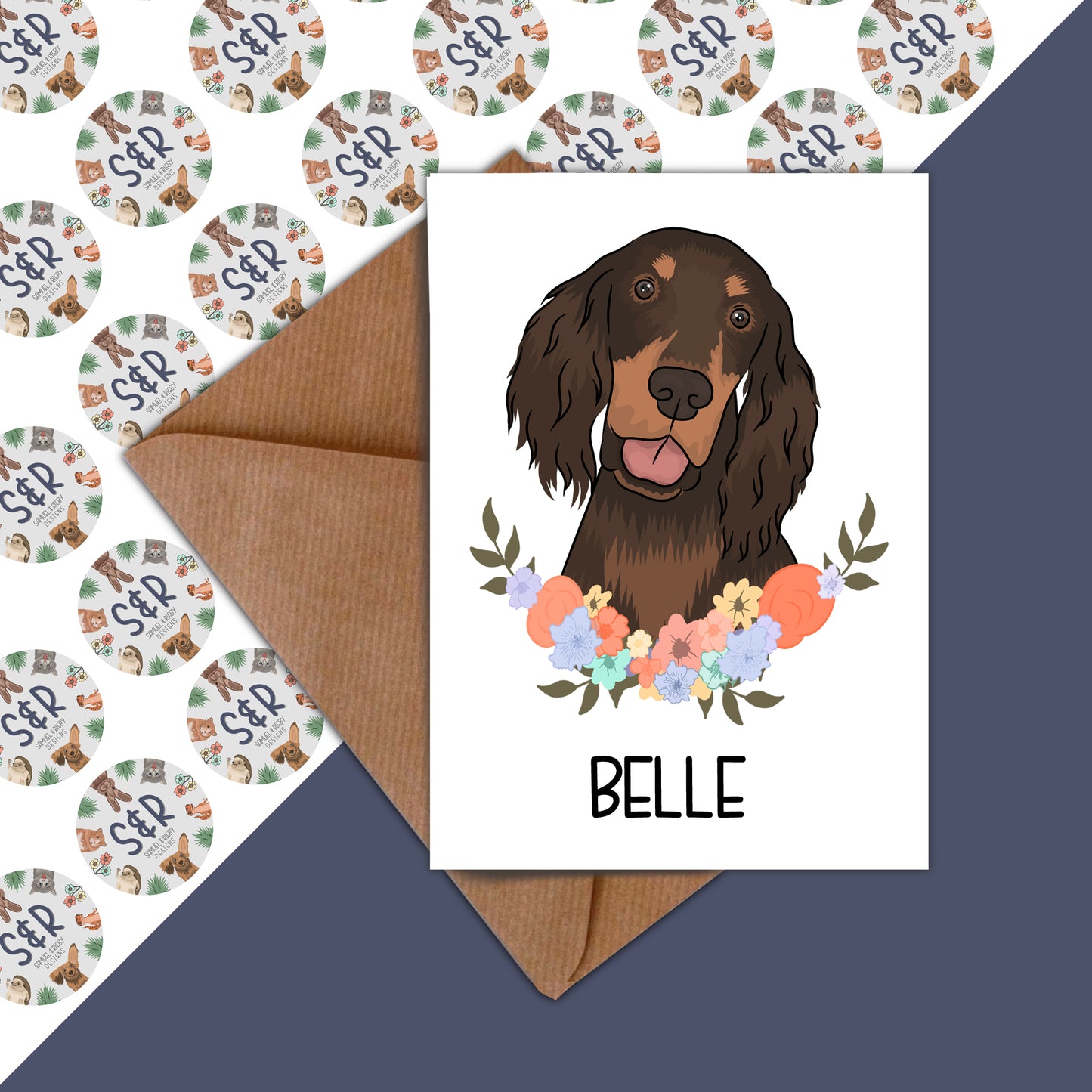 A card featuring an illustration of a dog with a floral wreath background, addressed to a pet named 'Belle'.