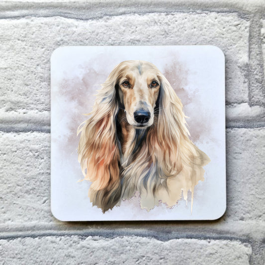 An Afghan Hound with long flowing hair on a smoky background. This image is on a white drinks coaster.    The coaster is placed on a grey, brick effect surface.