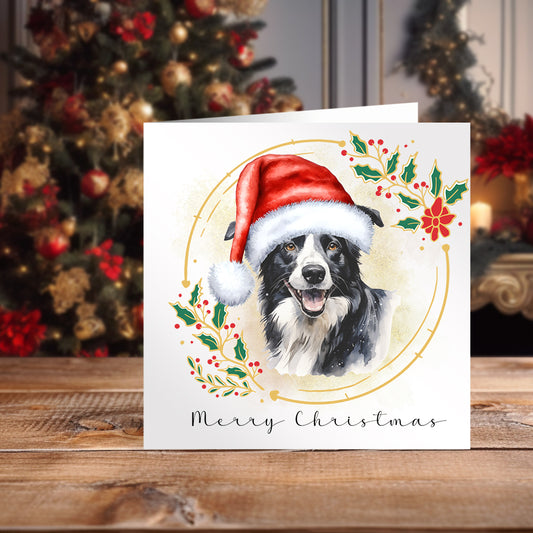 Border Collie wearing a Santa hat on a white Christmas themed card positioned in front of a decorated Christmas Tree.