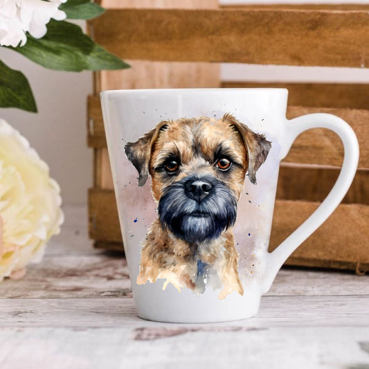 A ceramic latte mug with an image of a Border Terrier dog on the front.