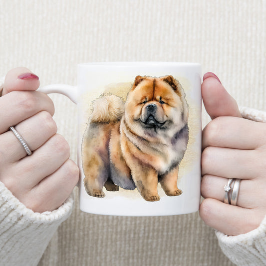 A standing Chow Chow dog with a very cute expression adorns this white ceramic mug.  A gold misty background decorates the mug which is being held by a woman with both hands.