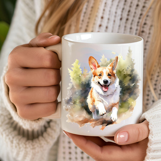 White 11oz ceramic mug with a vibrant printed image of a Corgi dog running through green foliage. The mug is being held in a woman's hands.