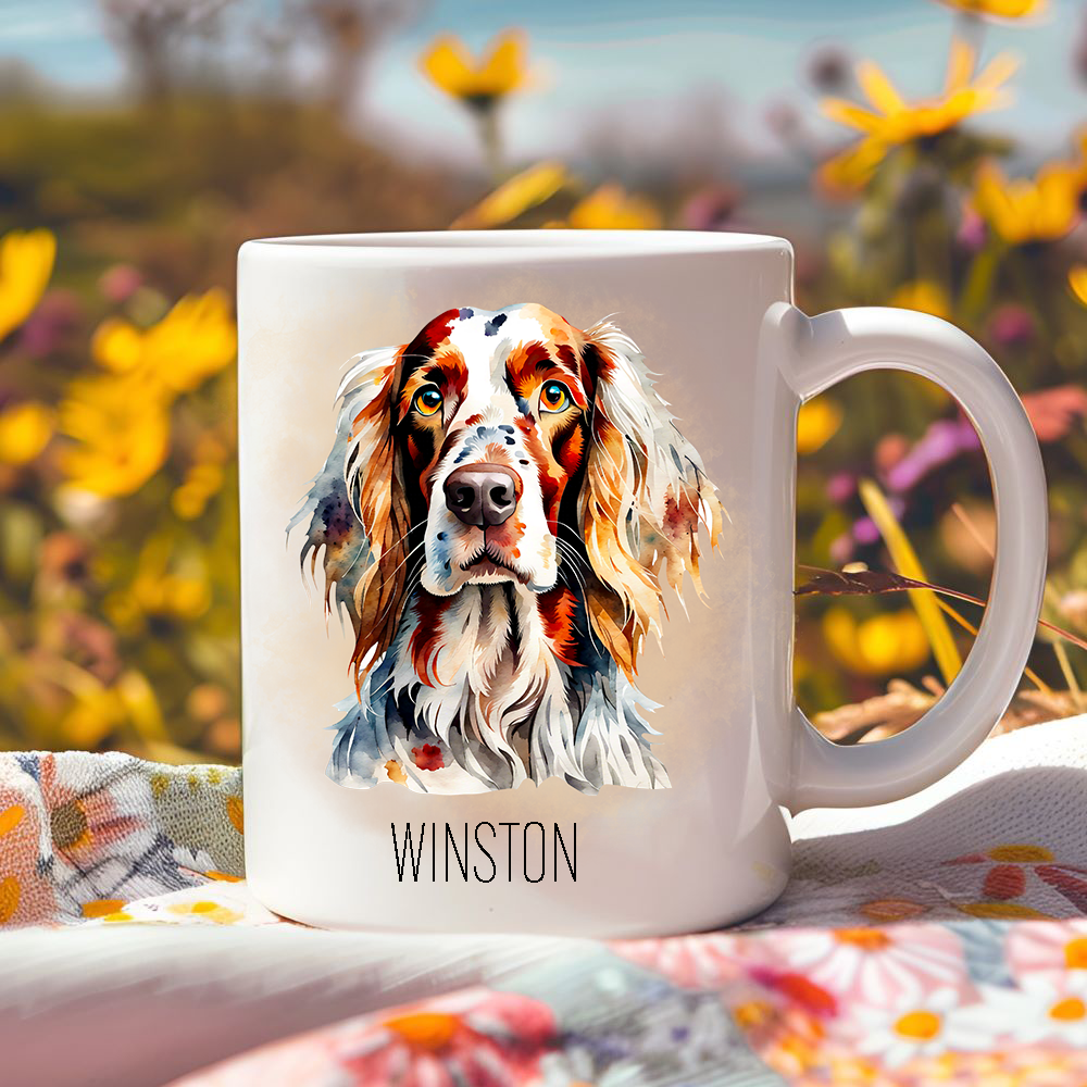 Bright yellow flowers surround this lovely personalised ceramic mug a head-shot of a Englsih Setter.  The mug is placed on a floral multicoloured tablecloth.