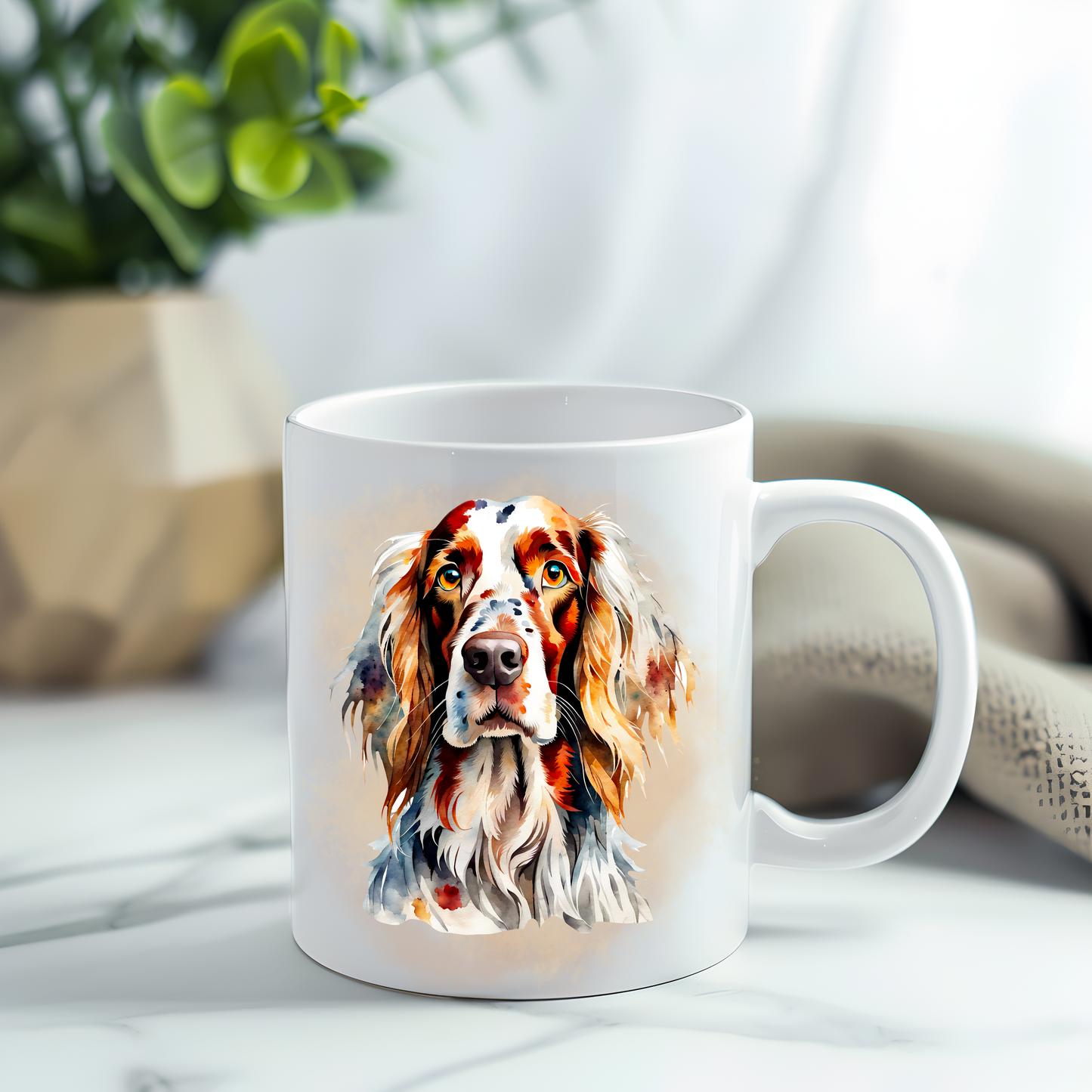 English Setter headshot on a white ceramic mug which has been placed on a grey marble surface.  A plant decorates the left corner.