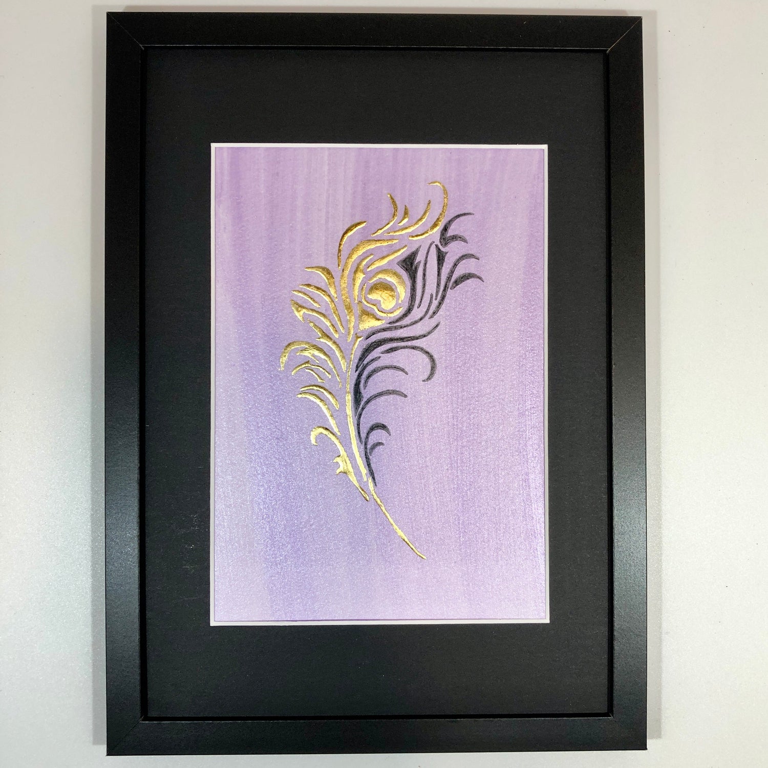 gold leaf feather