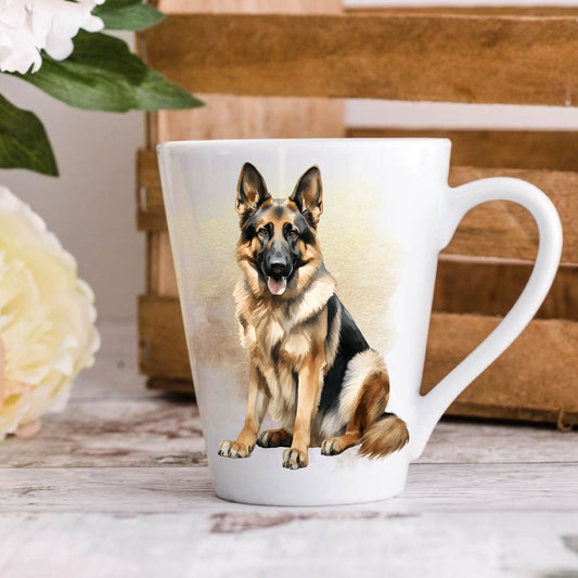 A latte coffee mug with a printed image of a German Shepherd dog on the front side, placed on a wooden surface with a blurred background.