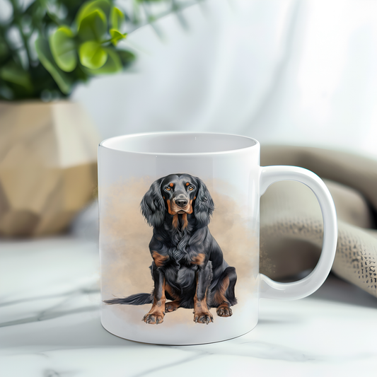 A Gordon Setter is in a sitting position on a white ceramic mug which has been placed on a grey marble surface. A plant decorates the left corner.