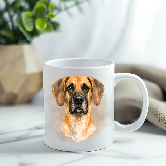 Fawn Great Dane headshot on a white ceramic mug which has been placed on a grey marble surface. A plant decorates the left corner.