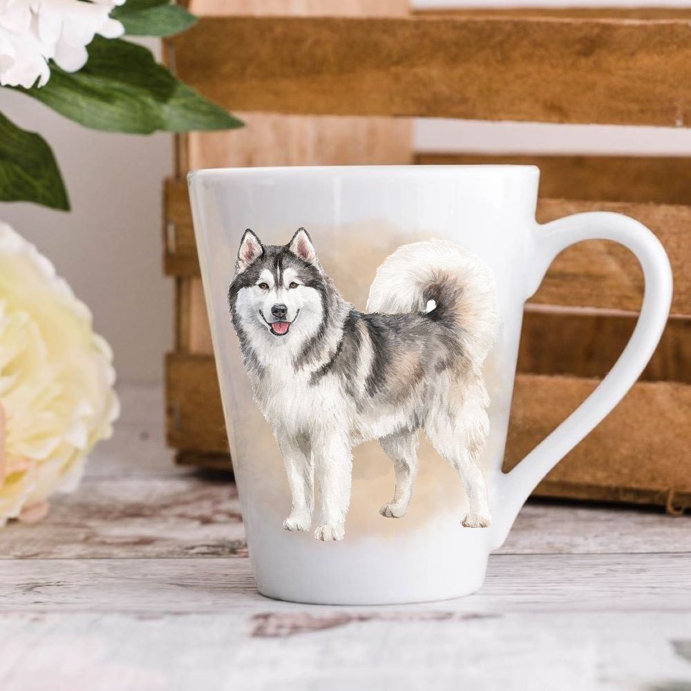 A white ceramic latte mug stands on a wooden surface with a crate in the background. The mug features a lovely smiling Husky.  A large yellow flower peeps in from the left-hand side.