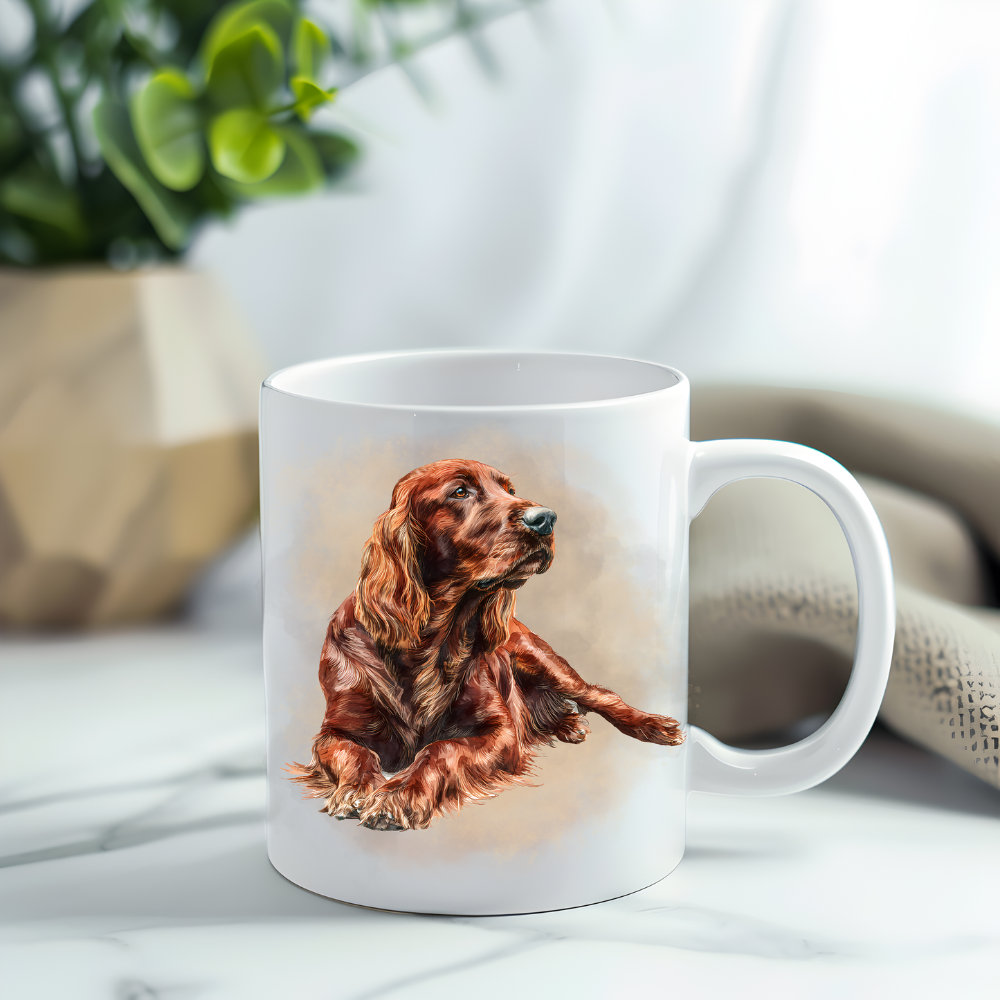 This coffee mug features a beautiful Irish setter on a white ceramic mug which has been placed on a grey marble surface.  A green plant sits in the left corner.