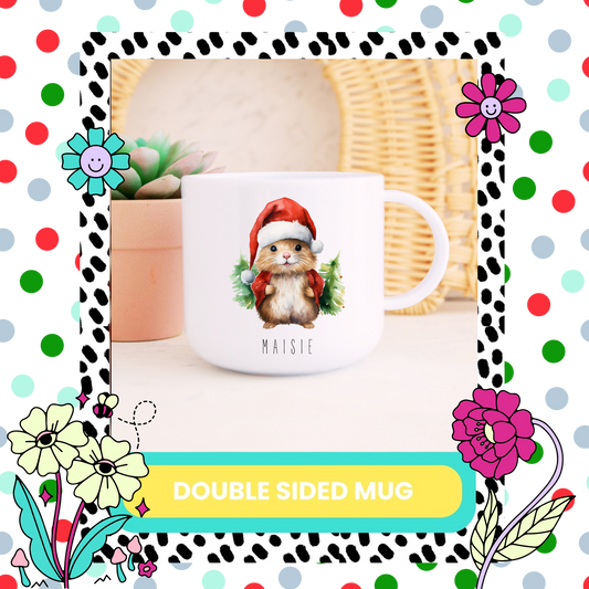A white 6oz double-sided mug with a Christmas themed design featuring a cartoon tiger character in a Santa hat, positioned on a table with colorful decorations around it.