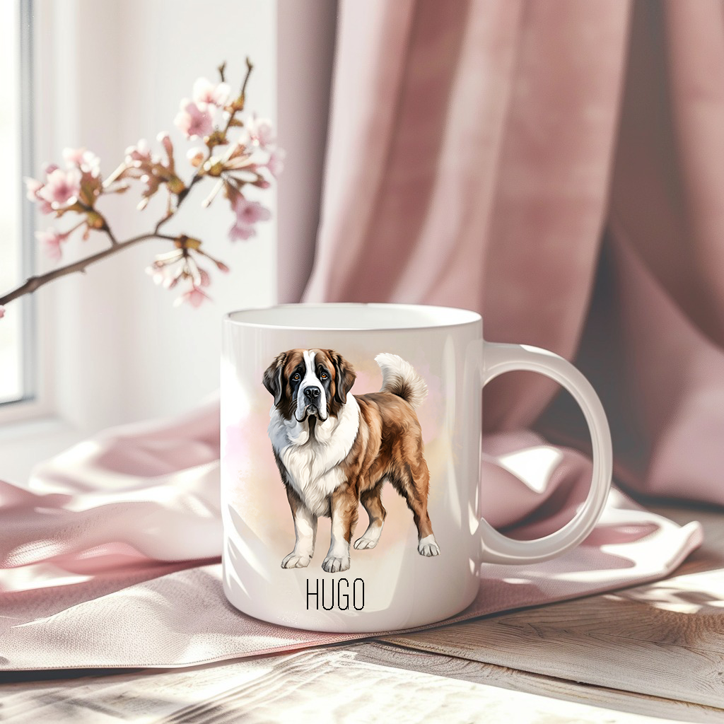 A pink drape sets the backdrop for white ceramic mug with the image of a Saint Bernard dog stood looking forward.  A stem of small pink flowers completes the image.
