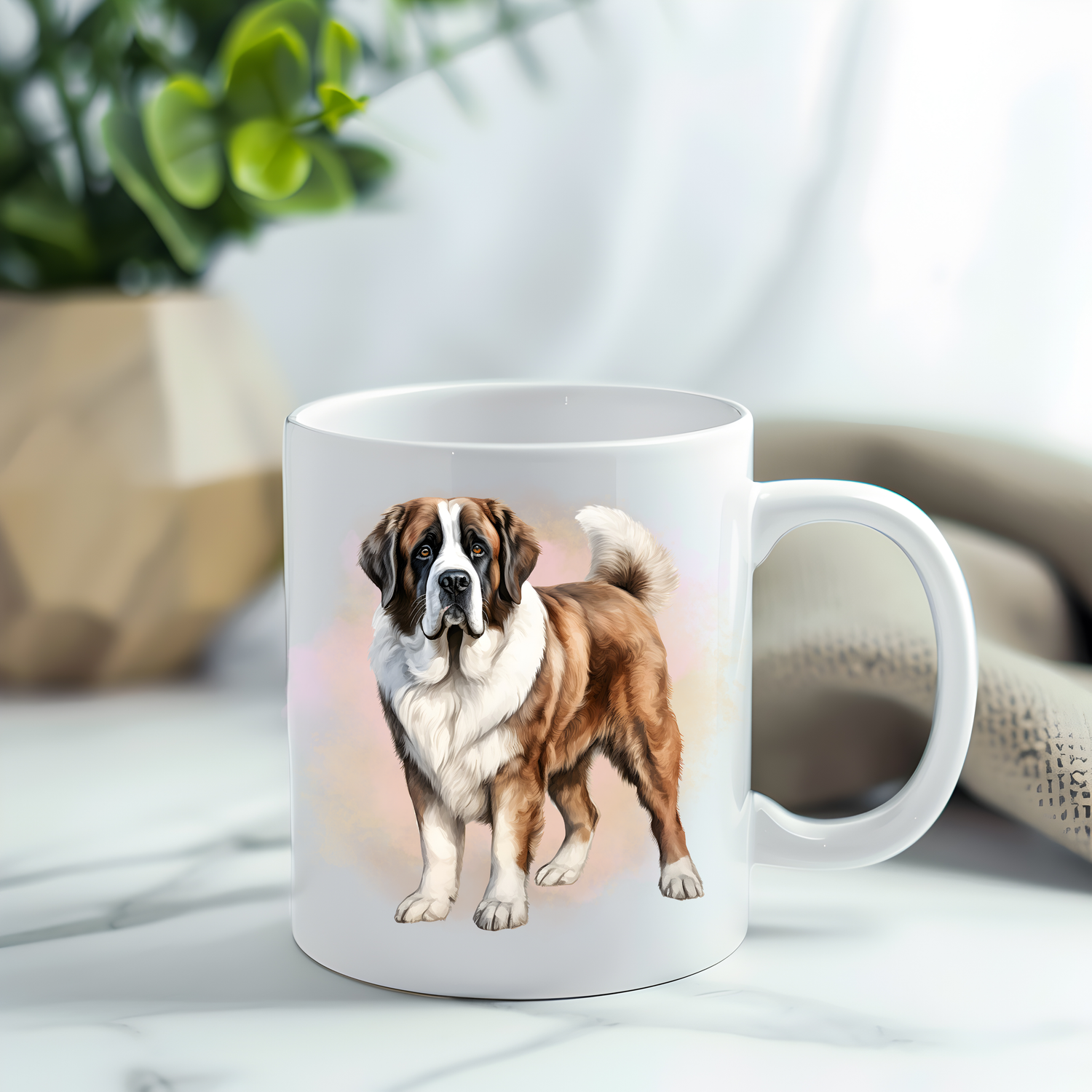 This coffee mug features a lovely, cuddly Saint Bernard on a white ceramic mug which has been placed on a grey marble surface.  A green plant sits in the left corner.