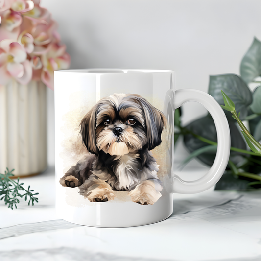 Personalised coffee mug featuring a Shih Tzu on a white ceramic mug which has been placed on white surface. A large pink flower sits to the left with dark green foliage on the right to accessorizes the image.