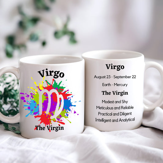 Two mugs with Virgo zodiac design and information on a white surface.