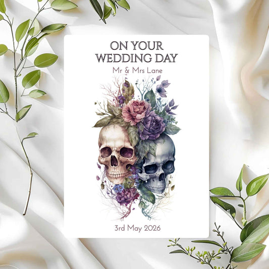 Wedding card with skulls and flowers on a white fabric background
