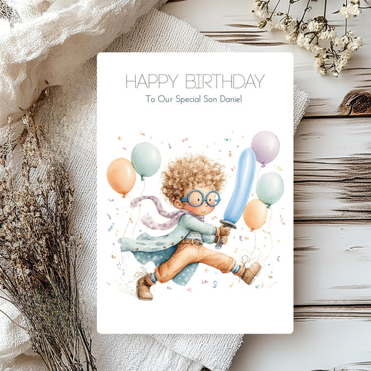 Birthday card with a child holding balloons and a sword, surrounded by flowers on a wooden surface.