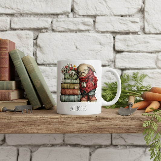 Mug with bookish rabbit design on a wooden shelf with books and carrots.
