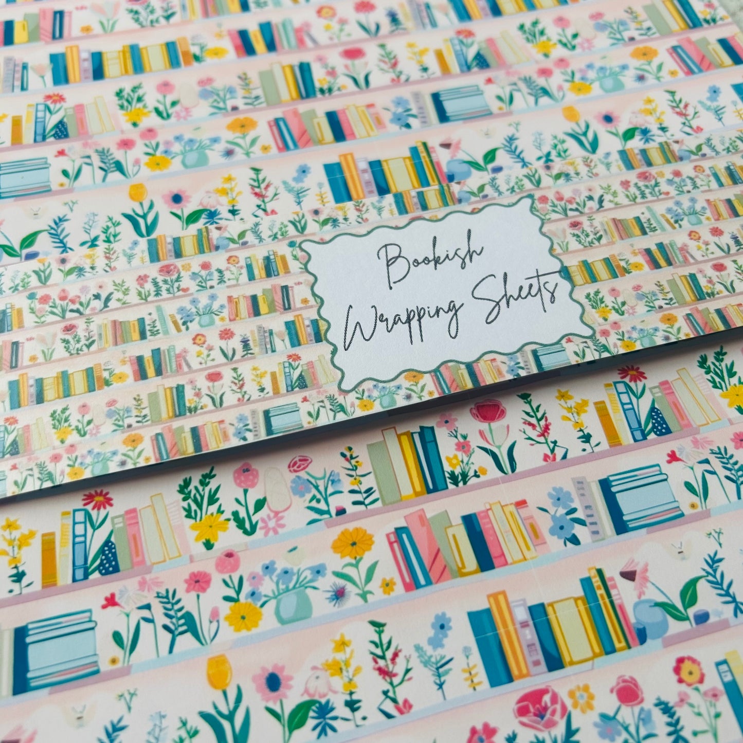 Set of colourful book-themed A4 wrapping sheets with 'Bookish Wrapping Sheets' label.