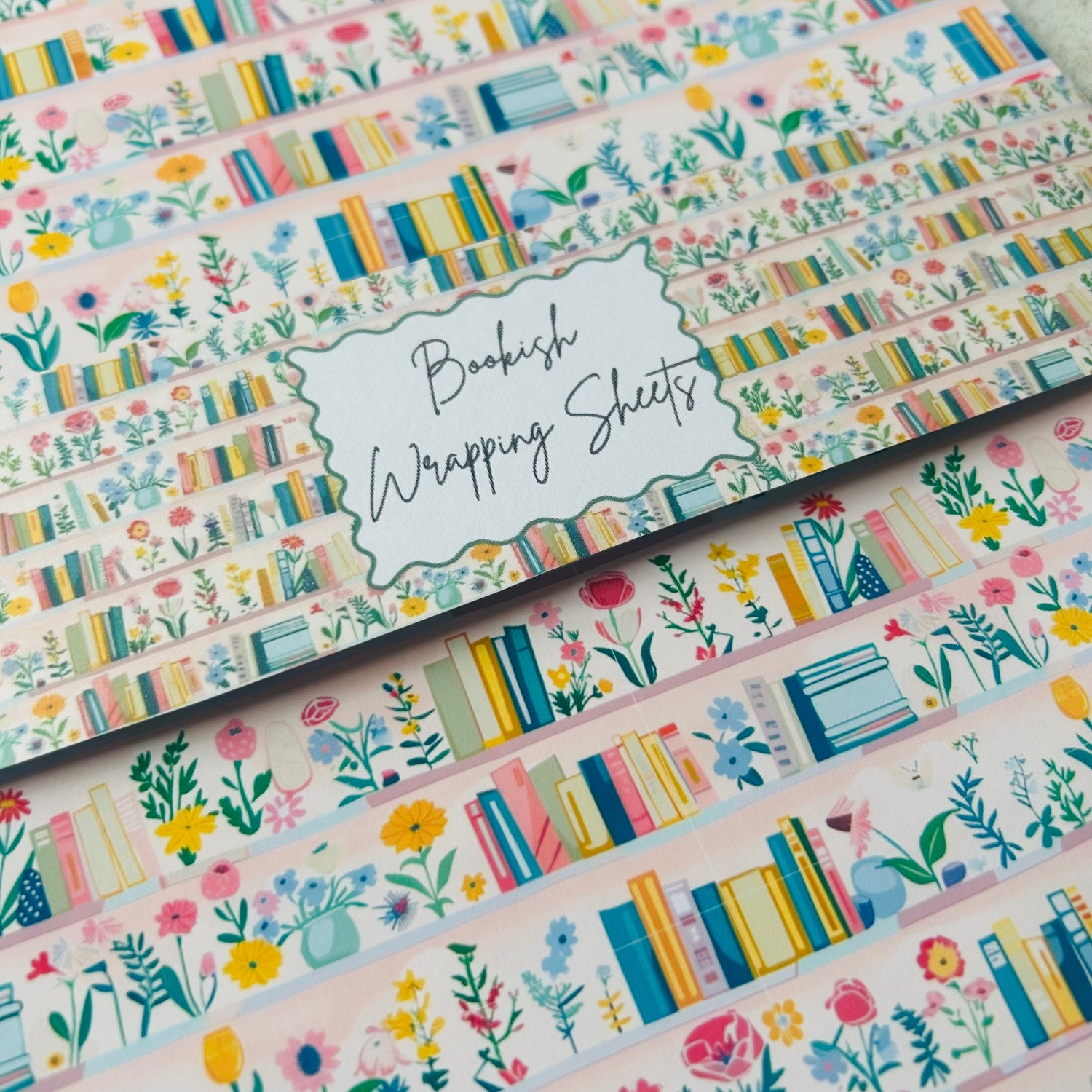 Book-themed wrapping sheets with colourful designs on a white background