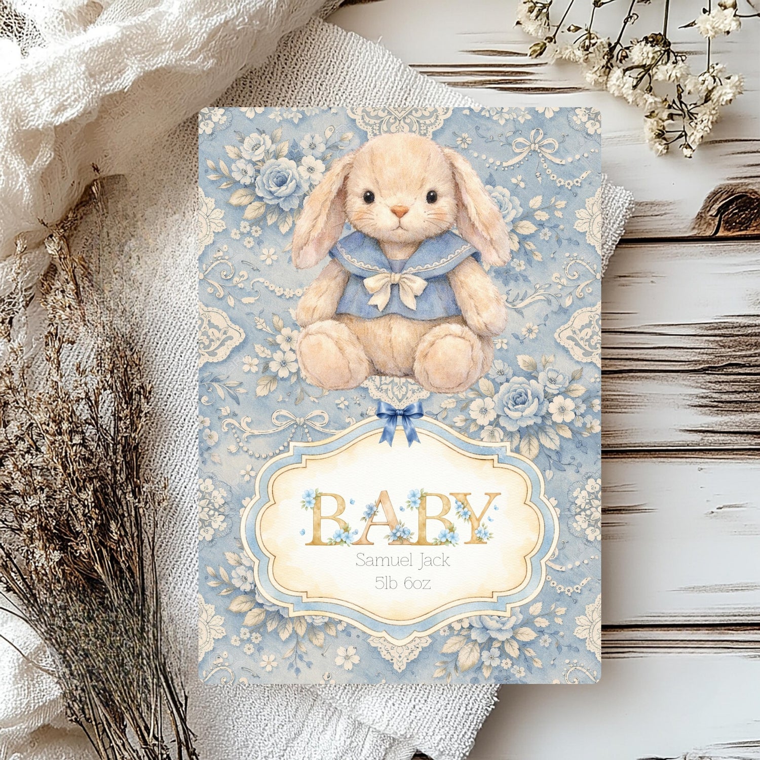 Baby card with a bunny design on a floral background