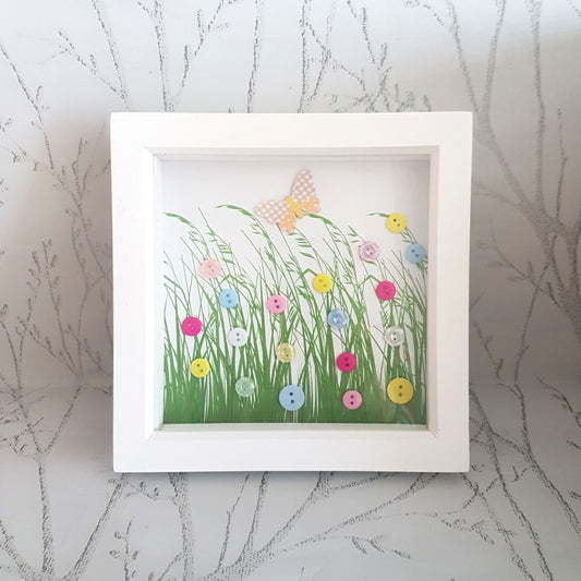 Button art in a frame with butterfly