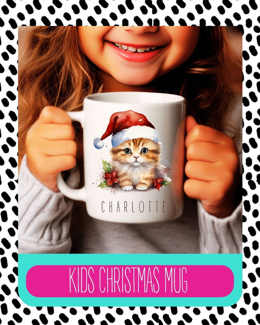 A child holding a white ceramic mug with a personalised text and a cat design, with the text 'Kids Christmas Mug'.