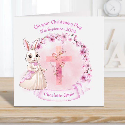 christening card with girl rabbit, floral wreath and cross. Personalised.