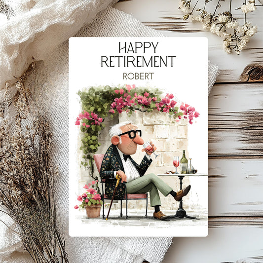 Happy Retirement card with a cartoon character sitting at a table with flowers and wine glasses.