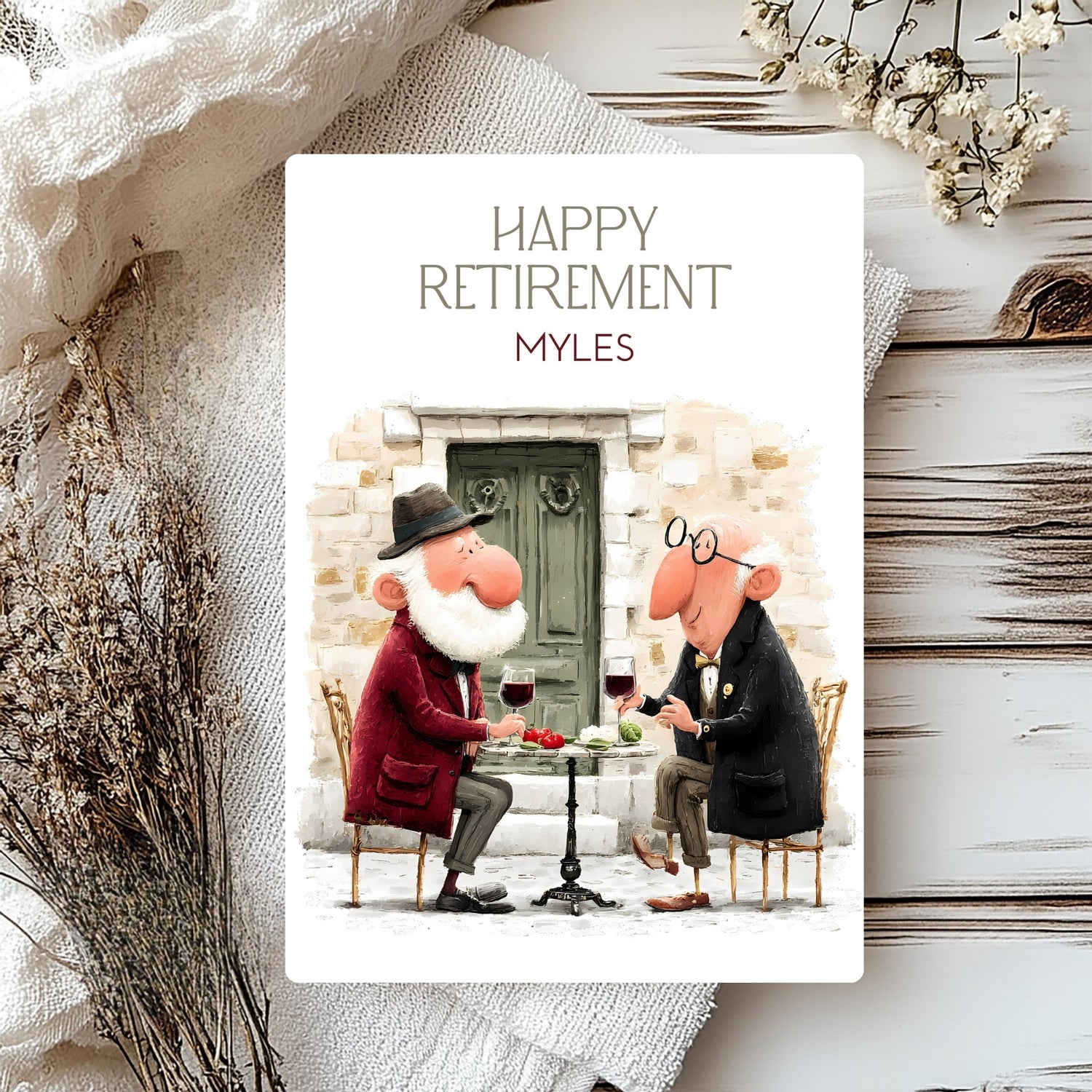 Retirement card with two animated characters sitting at a table, surrounded by decorative elements.
