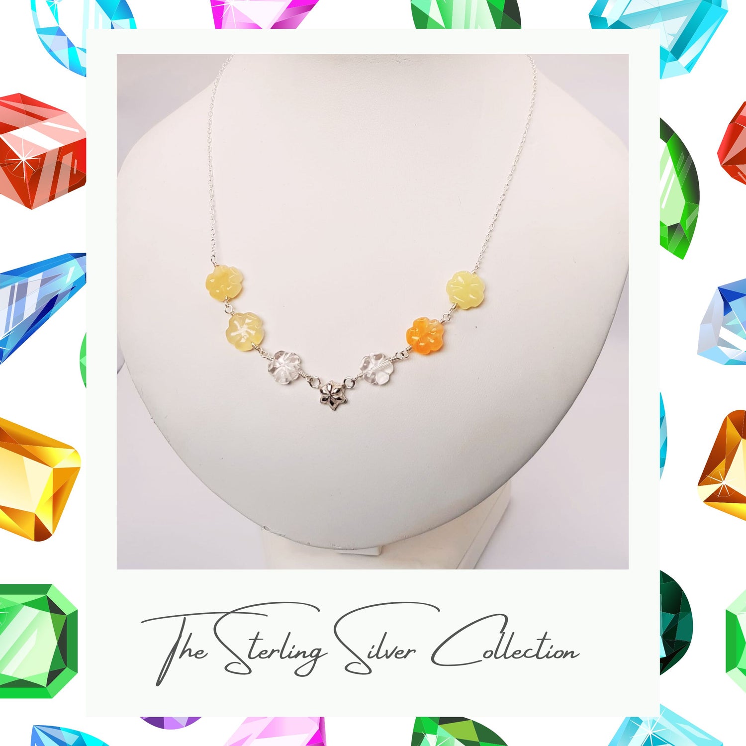 Corner view of a single gemstone necklace, text reads sterling silver collection.