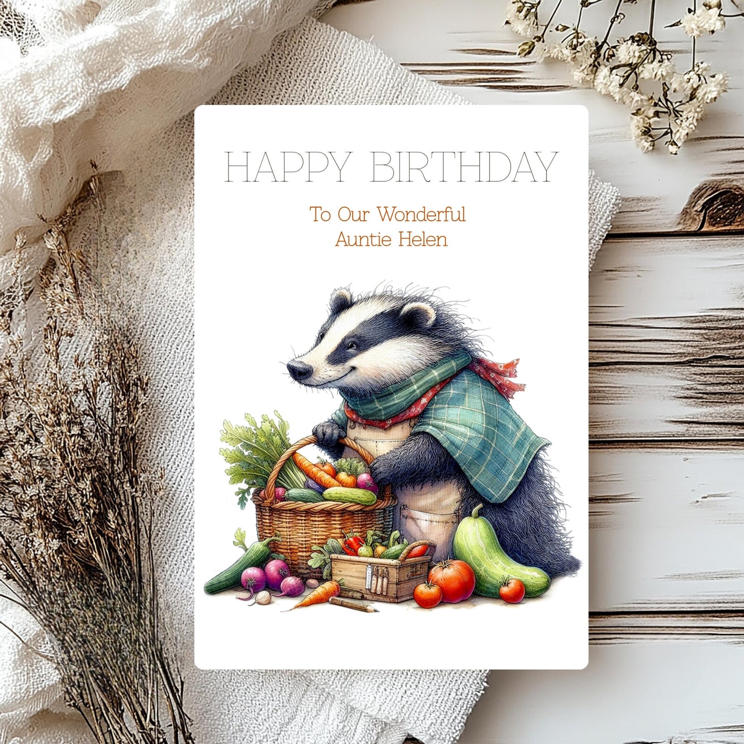 Birthday card with a badger holding a basket of vegetables on a rustic background