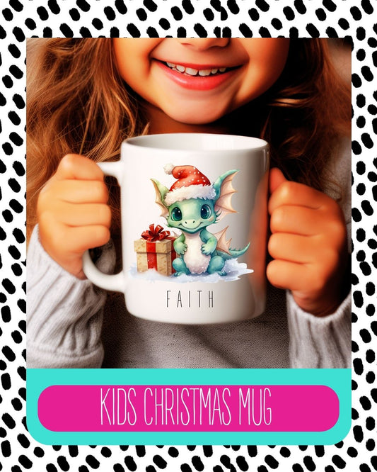 A ceramic Christmas mug with a whimsical dragon design, held by a child, with the text 'Kids Christmas Mug' and 'Faith' on the mug.