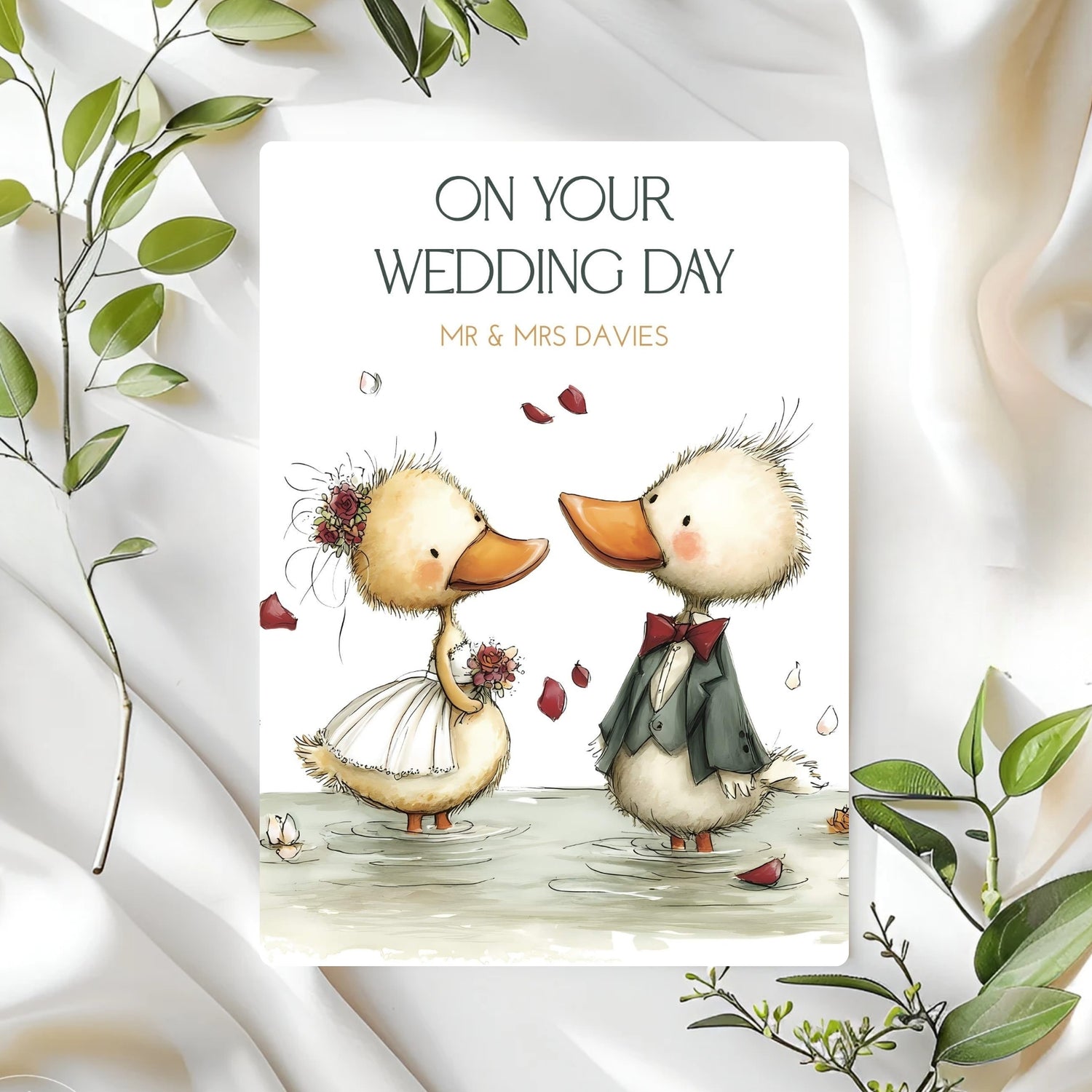 Wedding card featuring cute ducks and personalised with the couples name.